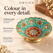 Decorative details of the turquoise bowl, including the floral centre and scalloped edge.