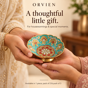 Turquoise floral décor bowl presented as a gift; styling accessories are not included.