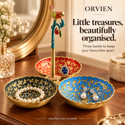 Three-bowl bird stand styled to organise jewellery and small personal items.