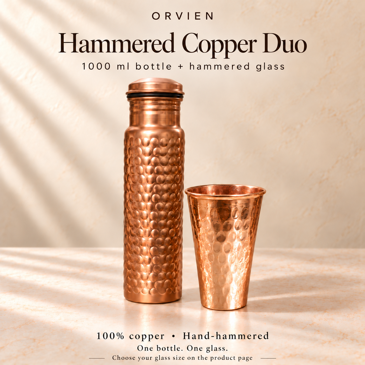 1000 ml copper bottle and hammered glass set — hero. Representative glass shown; select glass height on the product page.