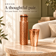 1000 ml copper bottle and hammered glass set — lifestyle. Representative glass shown; select glass height on the product page.