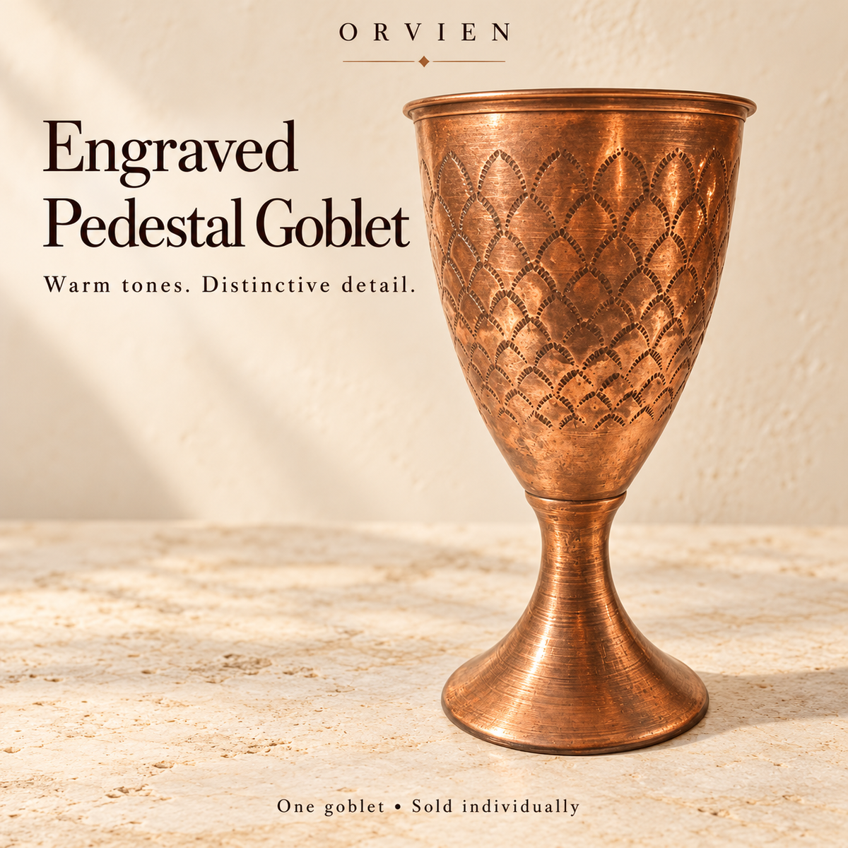 ORVIEN engraved copper pedestal goblet with rolled rim and scalloped pattern, sold individually.