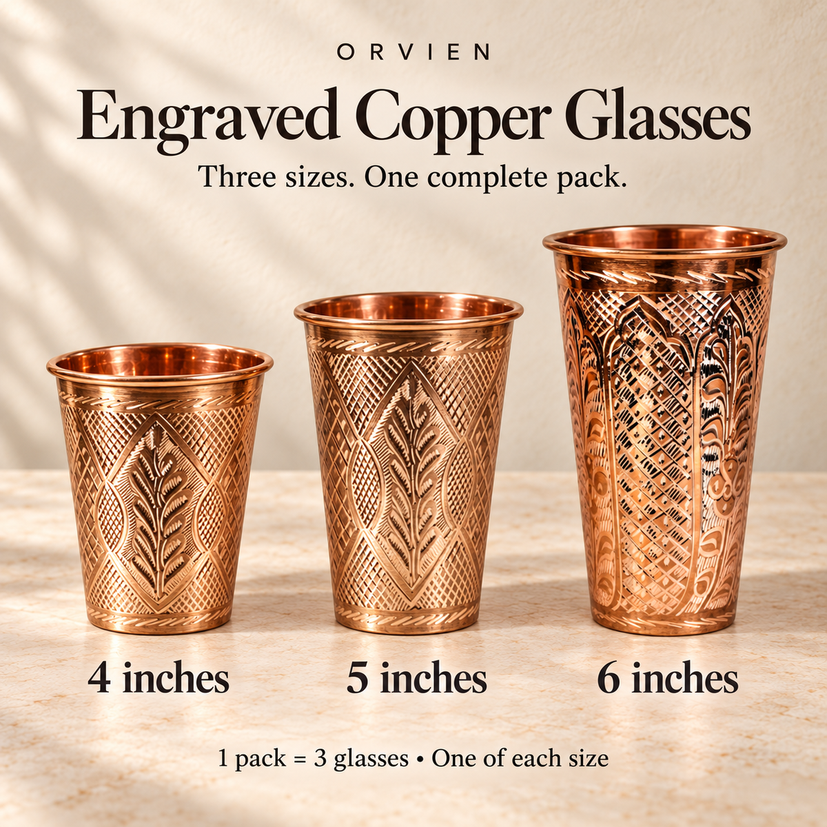 One mixed pack of engraved copper glasses, one each in 4, 5 and 6 inches.