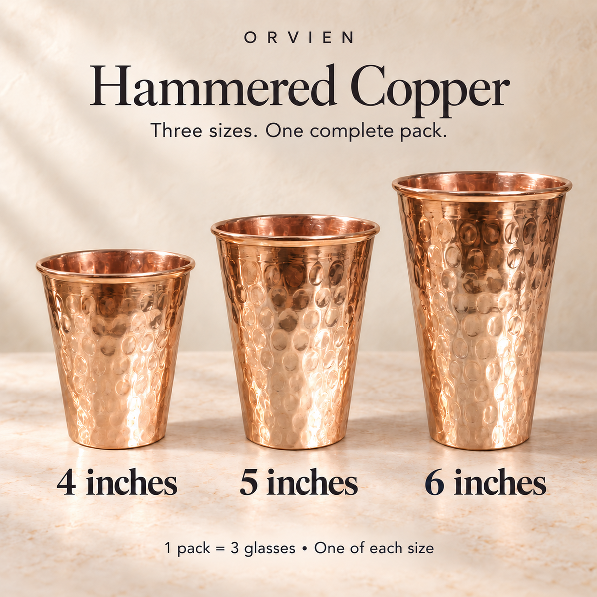 One mixed pack containing three hammered copper glasses: one each in 4, 5 and 6 inches.